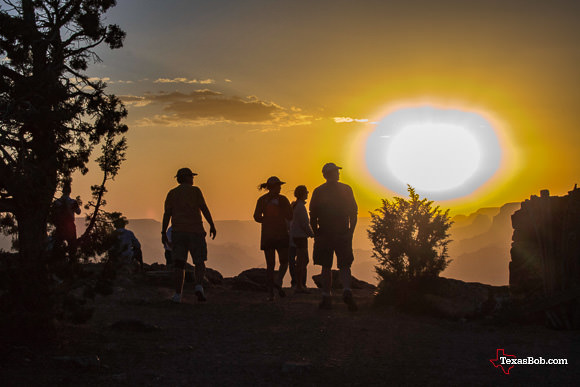 People watch the sunset at Desert View